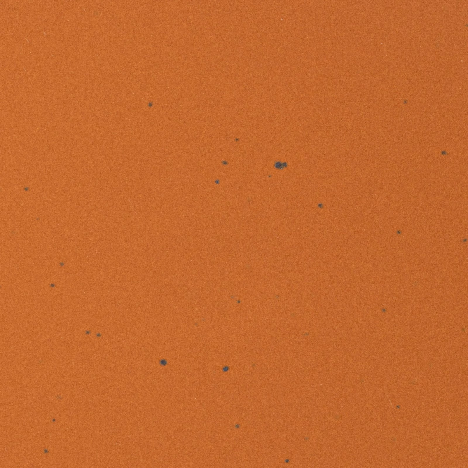 Close-up of the orange glaze on a Ember Heova soup bowl
