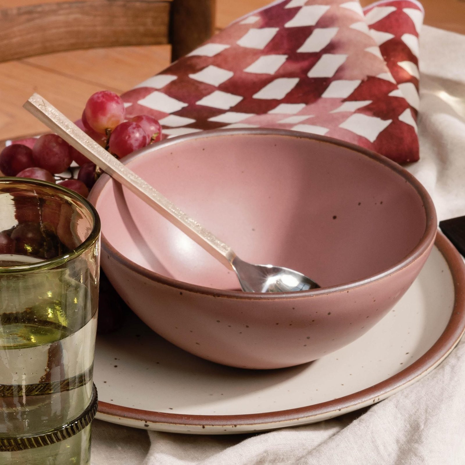 Lilac Heova soup bowl in a table setting with other dinnerware
